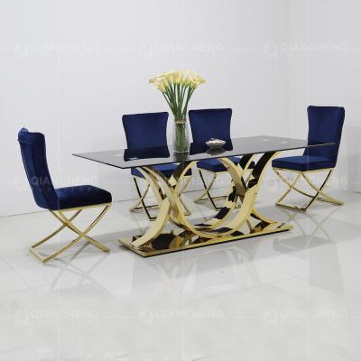 China mesa de comedor de cristal de acero inoxidable moderna de la mesa de comedor 78inch de 0.6m3 8 Seater en venta