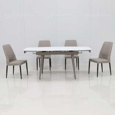 China Modern Home 1.1CBM SS Steel Furniture 4 Seater Extendable Dining Table Set for sale