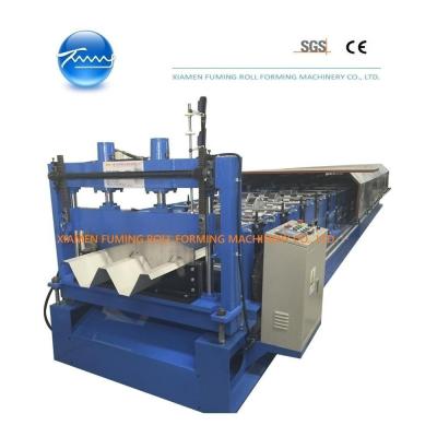China Custom Metal Floor Decking Roll Forming Machine Automatic Device for sale