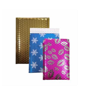 China Holographic Bubble Foil Shipping Mailing Bags Metallic Padded Envelopes for sale