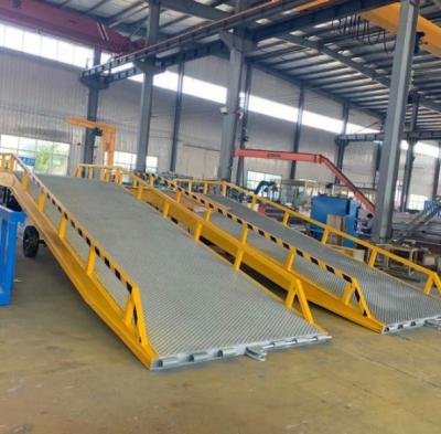 China Pedal Controlled Hydraulic Loading Dock Leveler High Duty Foot for sale