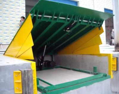 China Powder Coated Loading Dock Leveler Safety Chains 10 000-20 000 Lbs Mechanical Installation Hydraulic Dock Platform en venta