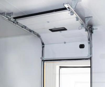 中国 Wind Resistant White Foam Filled Sectional Door Auto/Manual Operation Safety Edge Photocell overhead sectional Garage 販売のため