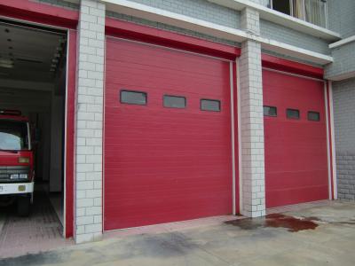 China Fire Station Insulated Sectional Overhead Doors  IP 54 Protection Class for sale