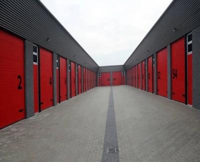 Китай Изолированная пожарным депо эффективность безопасности секционных дверей гаража высокопрочная продается
