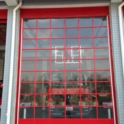 China Clase ajustada puerta seccional de aluminio de cristal 3 de la resistencia del viento de la altura para el parque de bomberos en venta