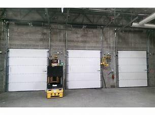 China Exterior Roll Up Overhead Sectional Industrial Vertical PU Panel Insulated Workshop Dock Doors for sale
