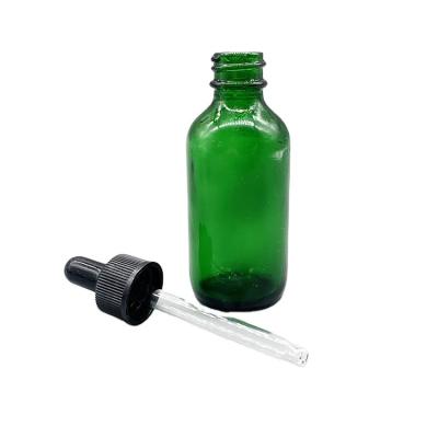 China 2oz Green Clear Dropper Boston Round Glass Bottle for sale