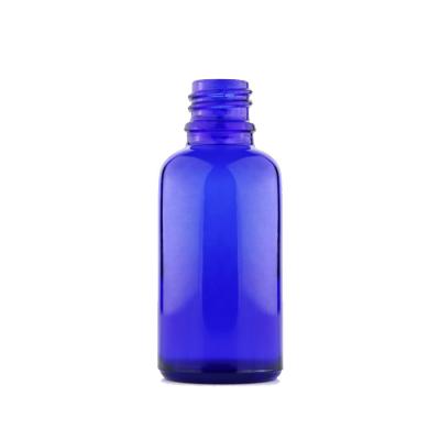 China Liquid Medicine Blue 2oz Boston Round Glass Bottles for sale