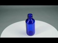 Liquid Medicine Blue 2oz Boston Round Glass Bottles