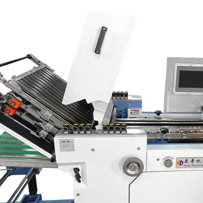 China Máquina de plegado de papel industrial cinturón silencioso accionado 530 mm ancho para folleto 220m/min en venta