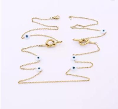 China Collares largos de moda de acero inoxidable Collares de oro apilados Mashup de globo ocular azul en venta