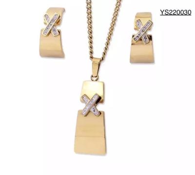China CE Stainless Steel Designer Jewelry X Rhinestone Inlaid Pendant Necklace Earrings Set for sale