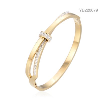 China Gold Stainless Steel Designer Jewelry Luxury Layered Diamond Bow Bangle for sale