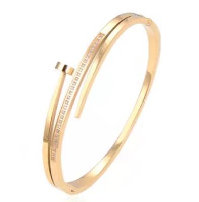 China ODM Party Stainless Steel Designer Jewelry Personalised Letter Nail Bangle Bracelet for sale
