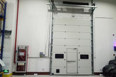 China Industrial 40mm Width Insulated Mental Sectional Doors High frequency Motor for sale