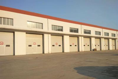 China El panel de bocadillo aislado 40m m seccional industrial de alta velocidad de la caja fuerte de las puertas en venta