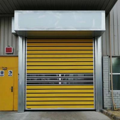 China Las puertas de acero de la seguridad del taller del bocadillo, construcción ruedan para arriba puertas del metal en venta