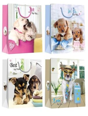 China Christmas Paper Gift Bags with lovely dog pattern desgins for sale