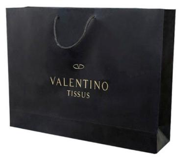 China Custom Luxury Purse Gift Paper Shopping Bag with Logo for sale