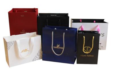China Custom logo printed luxury paper shopping bag, logo printed paper bag for sale