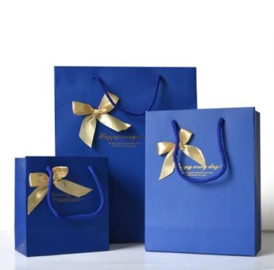 China Custom Luxury Bouquet Clothing Shopping Retail Black Paper Bags With Logo Print for sale