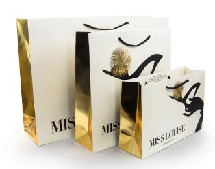 China Luxury Shopping Paper Bags with Your Own Logo Printing Paper Bags for sale