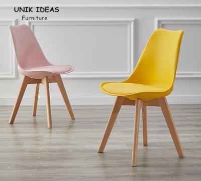 China Nordic Plastic Wooden Dining Chairs Seat Yellow Tulip Dining Chairs for sale