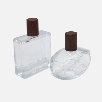 China 24/415 100ml Empty Perfume Bottles Leak Proof Cologne Spray Bottles for sale