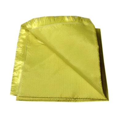 China Yellow Kevlar Fire Resistant Fabric Anti Cut 1414 Aramid Woven Cloth For Car for sale