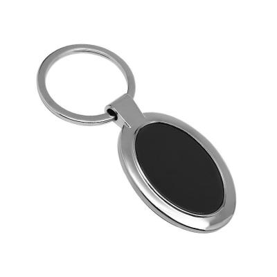 China Custom Promotional Rotating Blank Metal Car Keyring Round Shape Zinc Alloy Keychain for sale