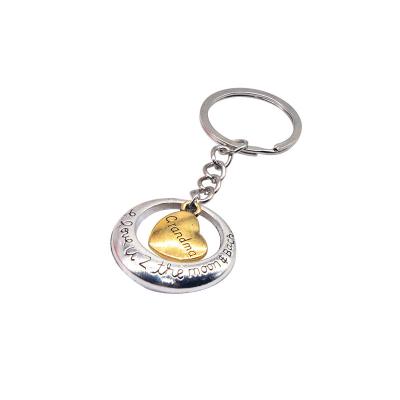 China Creative Lovely Heart Shape Car Gift Custom Metal Keychains personalized key rings for sale