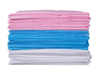 China Uso Piel-amistoso del salón de belleza del hospital de la sábana de la prenda impermeable médica disponible de la sábana en venta