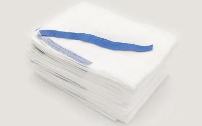 中国 100%の綿のガーゼはSteriliedの腹部の液体の吸収性のドレッシングABDのパッドにパッドを入れる 販売のため