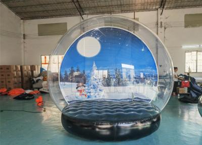 China Customized Backdrop Inflatable Giant Snow Globe Christmas Inflatable Human Size Snow Globe With Air Blower for sale