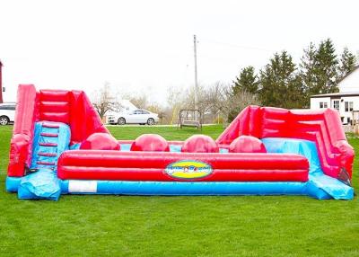 China Red Balls Inflatable Sports Games Wipe Out Interactive Obstacle Course for sale
