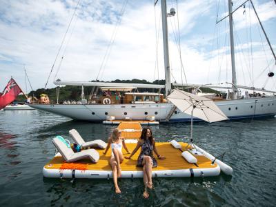 China Drop Stitch DWF Teakwood EVA Floating Air Pontoon Inflatable Yacht Island Dock Deck Platform for sale
