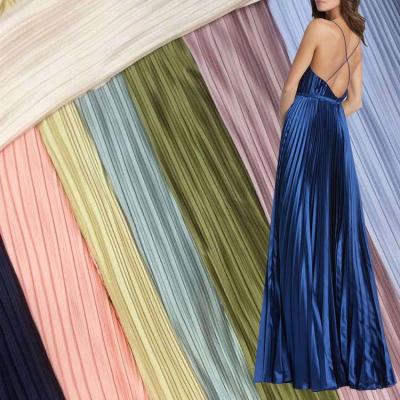 China Glitter Stretch Polyester Pleated Crepe Woven Fabric Wrinkle Satin For Dresses for sale