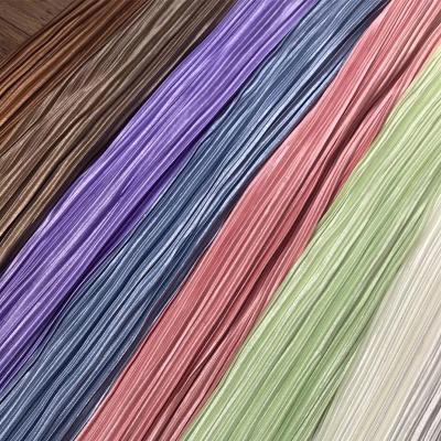China Sustainable Crepe Woven Fabric Shiny Stretch Plisse Pleated Satin Fabric Stripe for sale