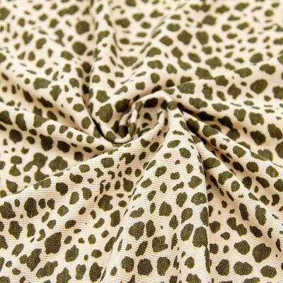 China El leopardo de Spandex del jersey imprimió estiramiento hecho punto rayón de la tela del poliéster en venta