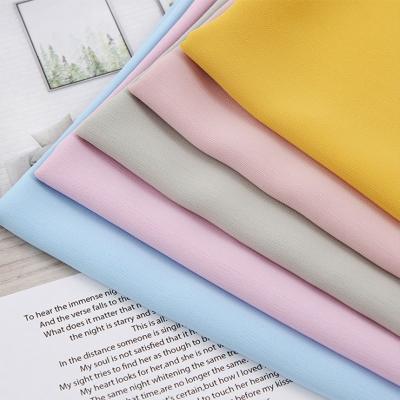 Китай Multicolor крепируйте материал платья 108gsm ткани 150cm полиэстера краски связи шифоновый продается