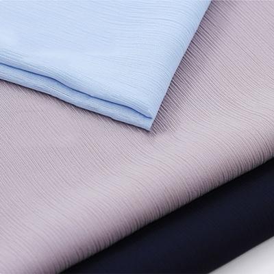 China 142GSM Crepe Yarn Dyed Woven Fabric 100% Polyester Apparel Fabric for sale