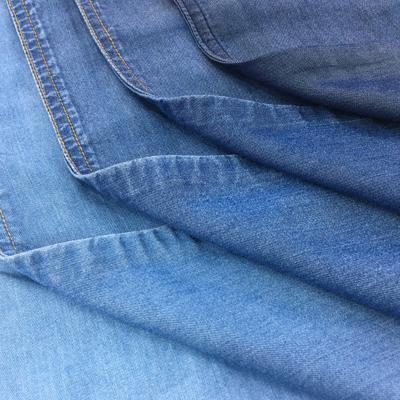 China Sustainable 100% Lycra 5.8/5.4oz Denim Jeans Fabric Plain Dyed for sale