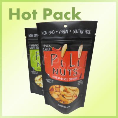China 56g Spicy Chili Pili Nuts Foil Lined Stand Up Packaging Pouch With Tear Notch for sale