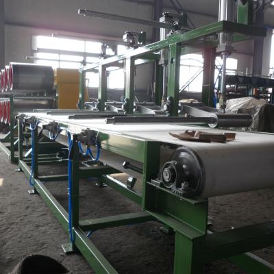China 500mm Rubber Sheet Coiling Packaging Drum Roll Cooling Curve Tyre Making Machine for sale