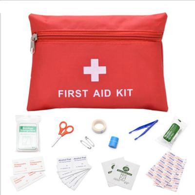 China Custom Multifunctional Home Emergency Medical First Aid Kit Bag Portable Outdoor Waterproof Survival First Aid Kit With Supplies for sale