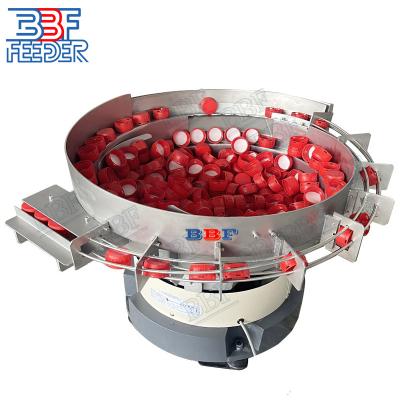 China Sistema de transportador Cap feeder Bowl Crown Caps Flip Top Cap Vibrating Linear Feeder à venda