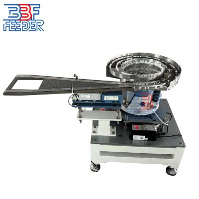 China Dual Channel Vibratory Bowl Feeder Bottle Crown Lid Vibrating Cap Feeder for sale