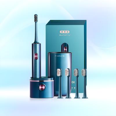 China Limpeza oral esterilizada por UV de qualidade Escova de dentes elétrica Q13 recarregável com caneca de viagem à venda