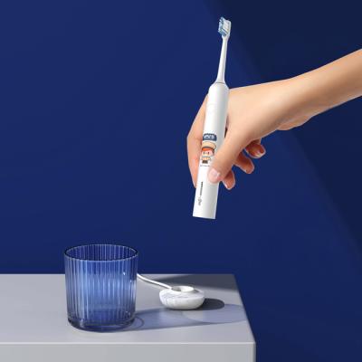 China Vibrating Sonic Power Toothbrush Rechargeable Magnetic Adsorption USB Charging for sale